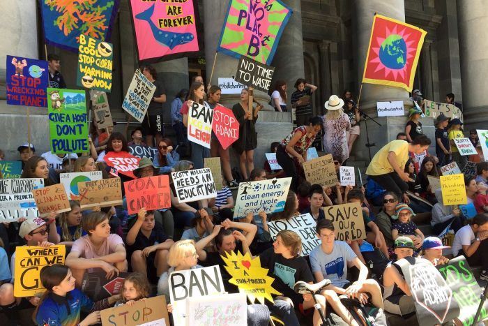 people protesting with signs