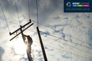 Electrician working on powerlines