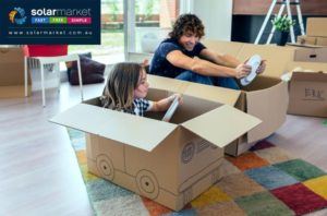 kids playing in moving boxes