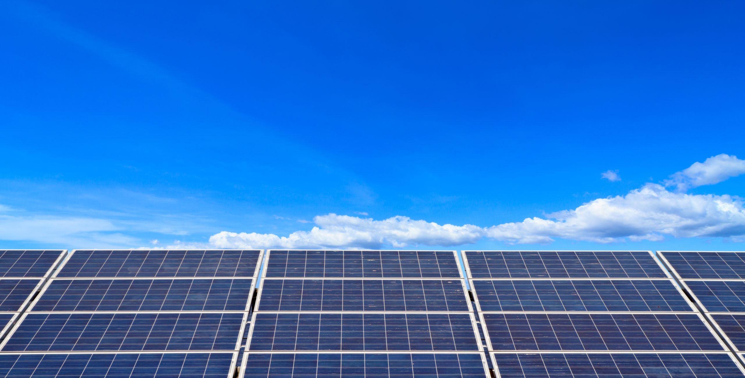 Solar panels against blue sky