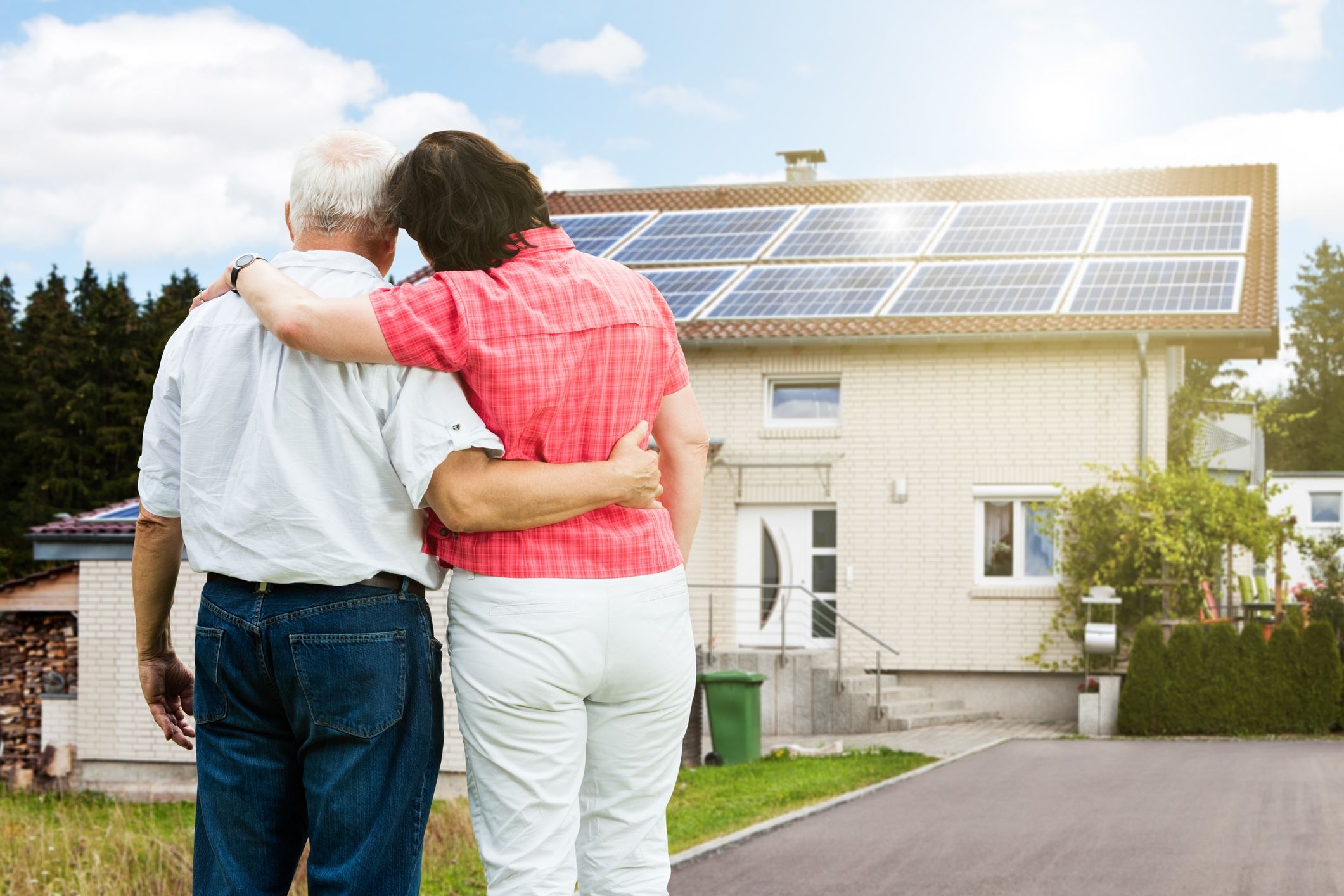 Happy Couple Solar Panels Home